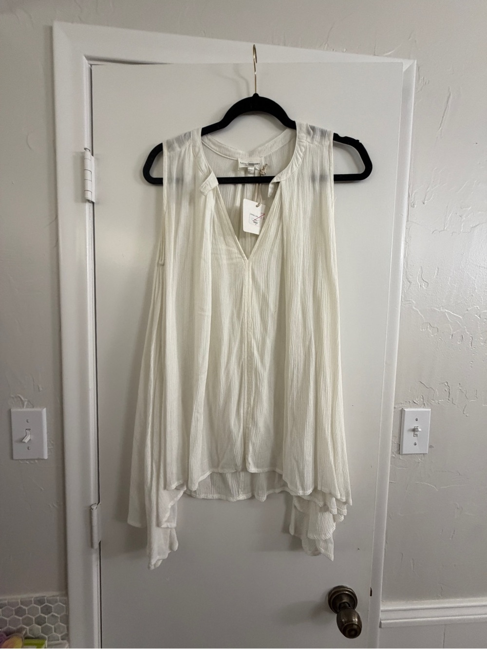 Love Ivory Sleeveless V-Neck Tunic Top